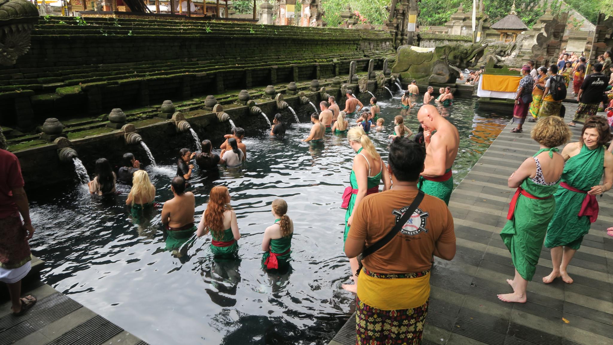 Figure 4: Tourists taking a purifying bath at the Pura Tirta Empul. Photo: Erik de Maaker